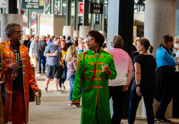 Paul McCartney Concert-Father and Son Dressed in Sgt Peppers Uniforms