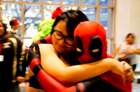 Anime Milwaukee-Woman Hugging Deadpool Cosplayer; 2019